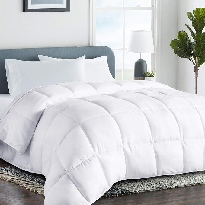 Royal Rest All-Season Duvet Inner on a made bed